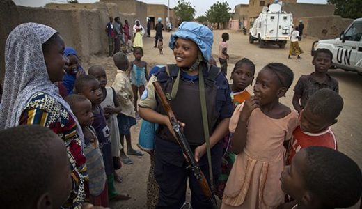 MINUSMA Officer from Rwanda speaks to the population, while patroling the streets of Gao, North of Mali.